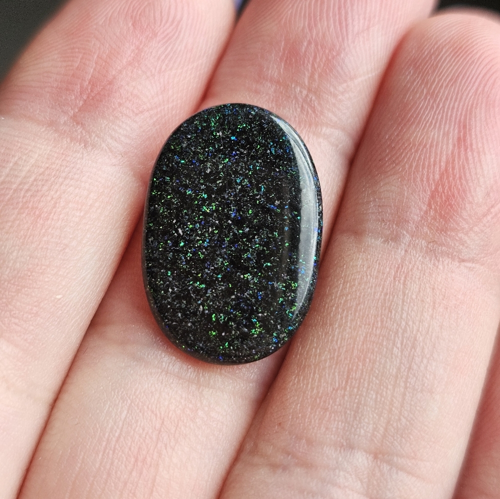 4.65 carat black opal amazing blue & green color flash with a few other colors!